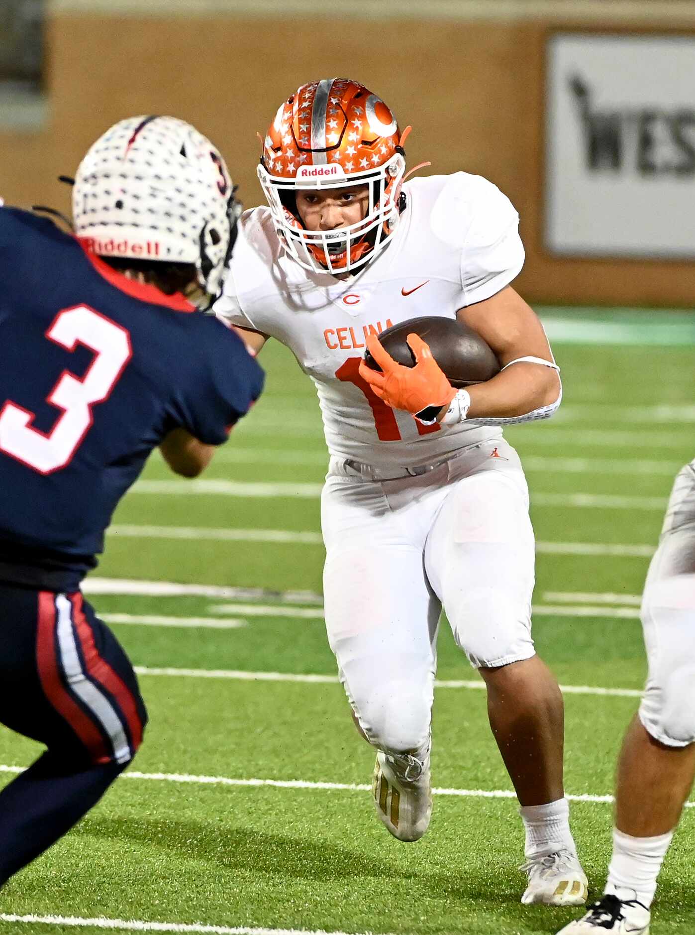 Celina's Gabe Gayton (11) runs upfield in the first half of a Class 4A Division II Region I...