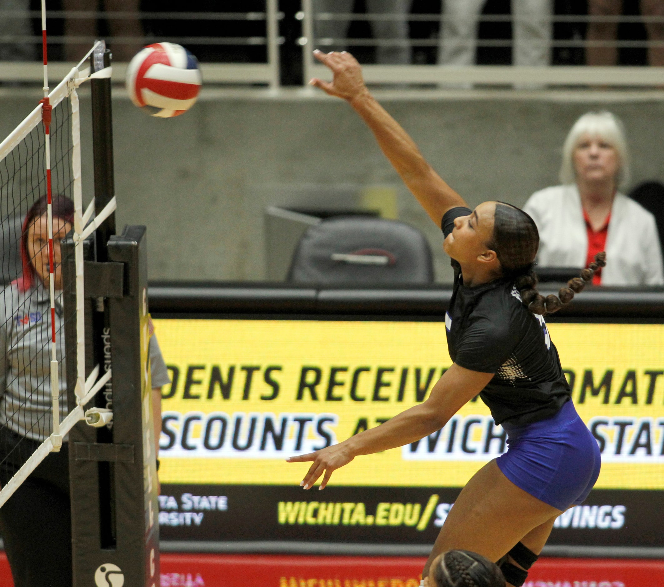 Byron Nelson outside hitter Sydnee Peterson (5) scores early in the 1st set of their...