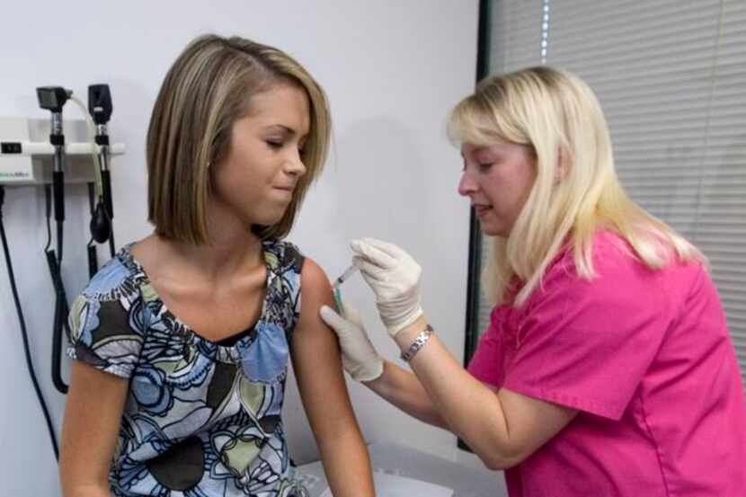 
 Lauren Fant receives her third and final application of the human papillomavirus vaccine...