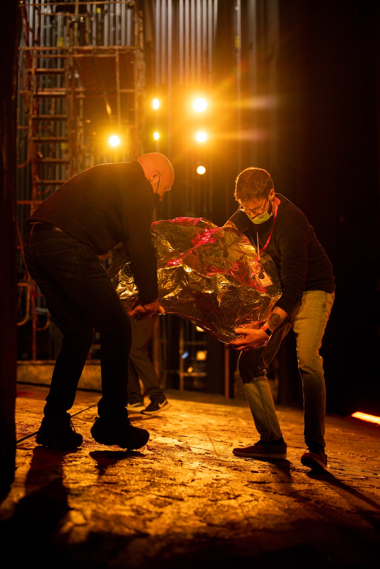 Supers bring in gold props during staging rehearsal for Dallas Opera’s Das Rheingold on...