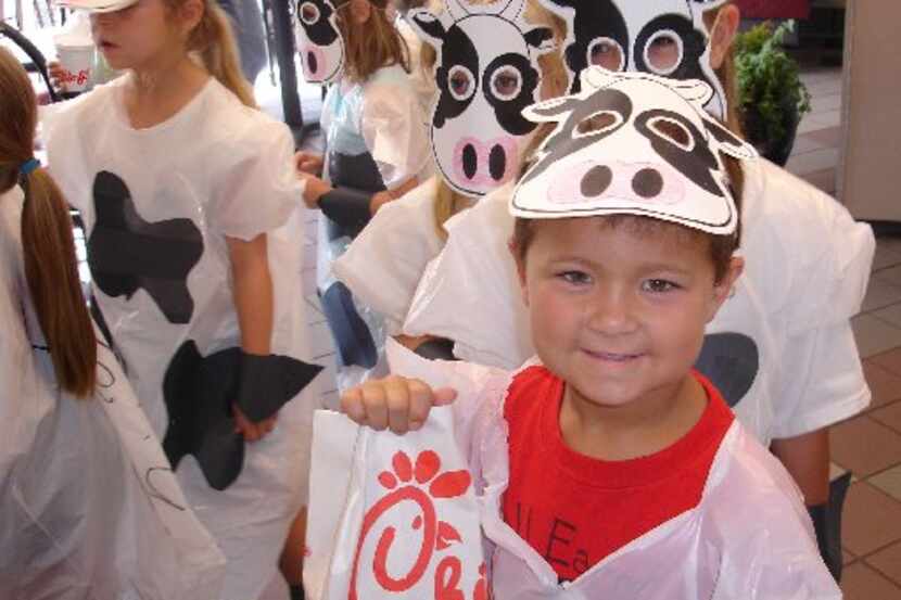 ORG XMIT: *S0427134867* 6/23/09 -- Cow-clad kids showed up June 23, 2009 to participate in...