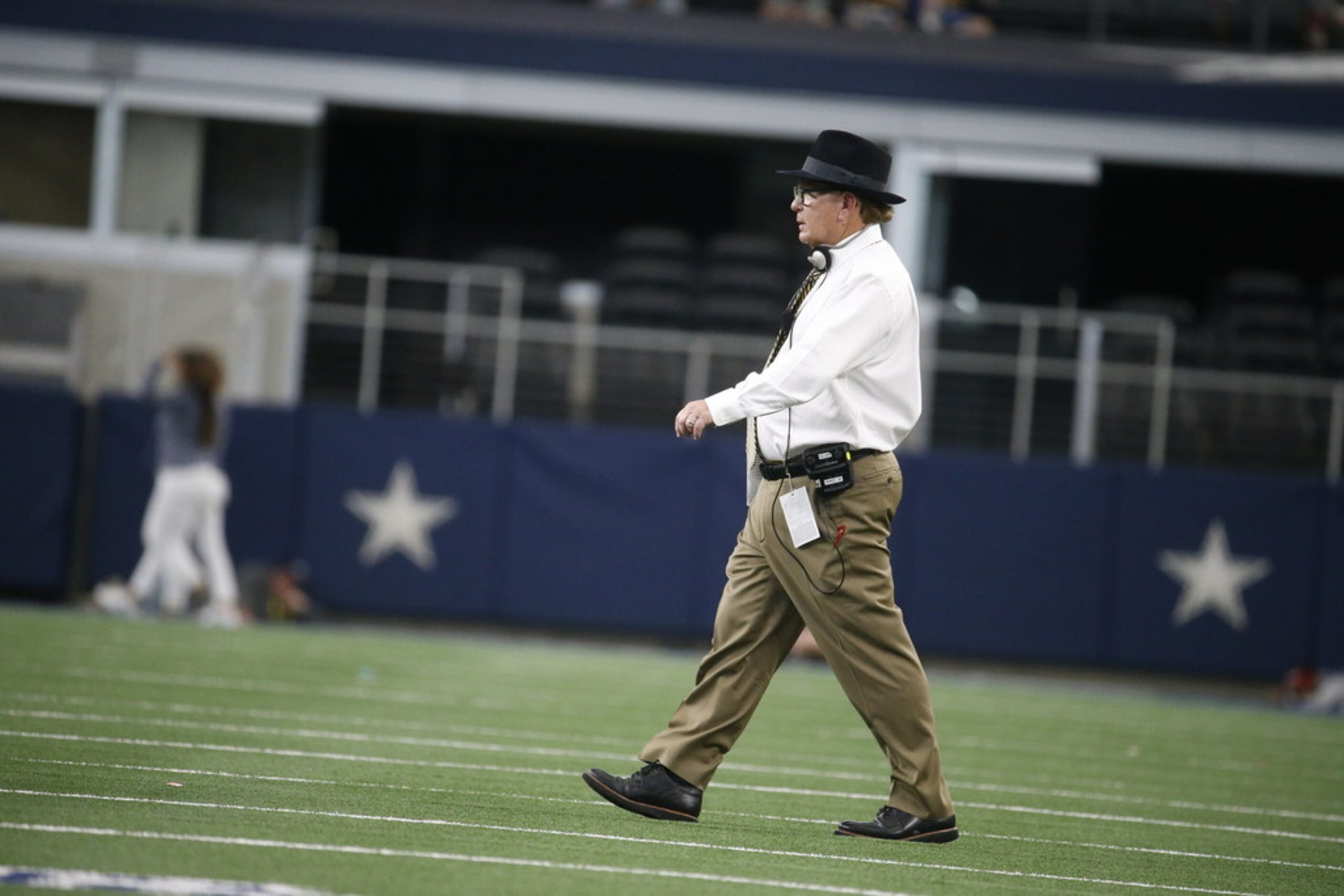 Highland Park's head coach Randy Allen walks onto the field during the second half of the...