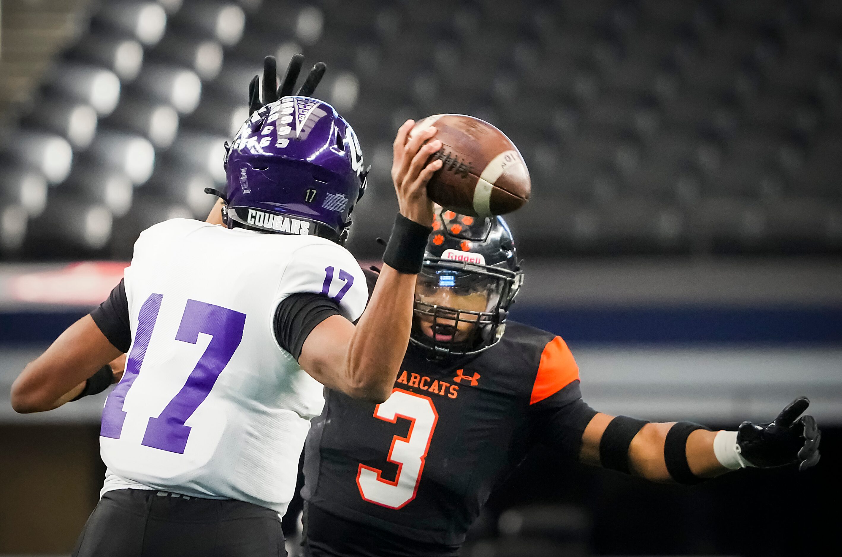 College Station quarterback Arrington Maiden (17) throws a pass under pressure from Aledo...