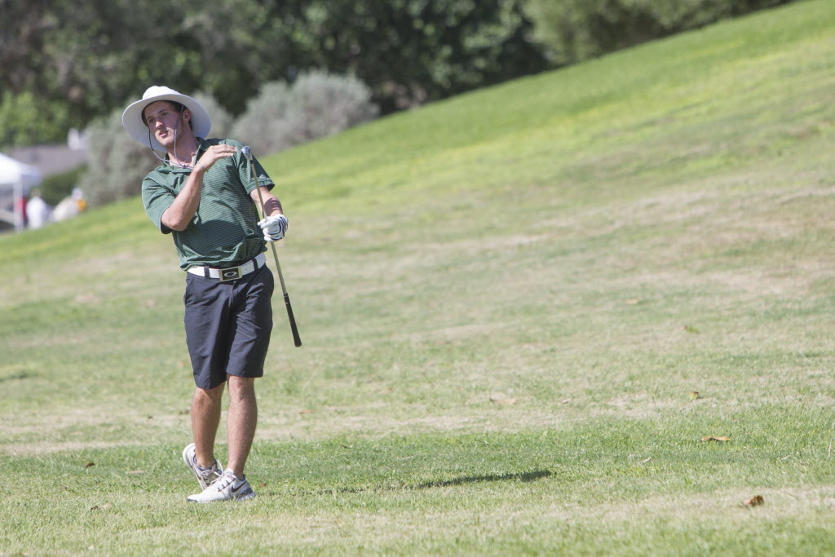 Southlake Carroll junior Hunter Glenn leans into a stroke at the UIL 5A State Golf...