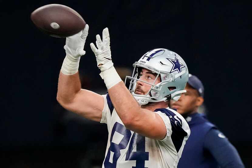 Dallas Cowboys tight end Sean McKeon catches a pass during the OTA team's practice at The...