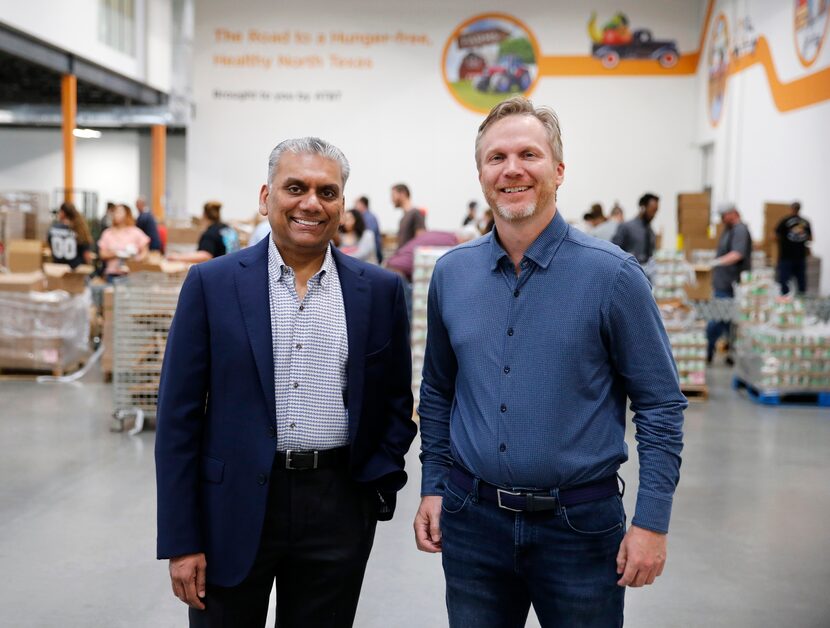 Anurag Jain, chairman of the North Texas Food Bank, posed with Shiftsmart president Patrick...