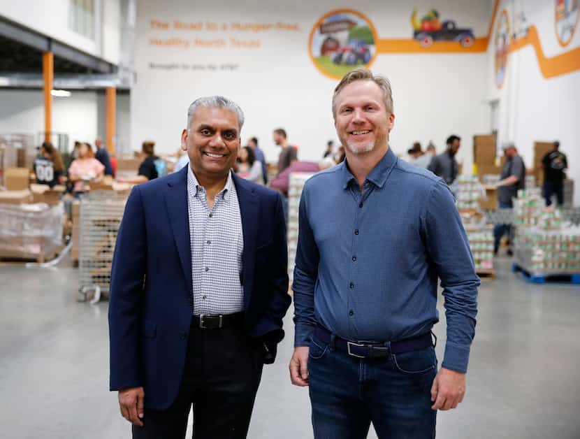 Anurag Jain, chairman of the North Texas Food Bank, posed with Shiftsmart president Patrick...