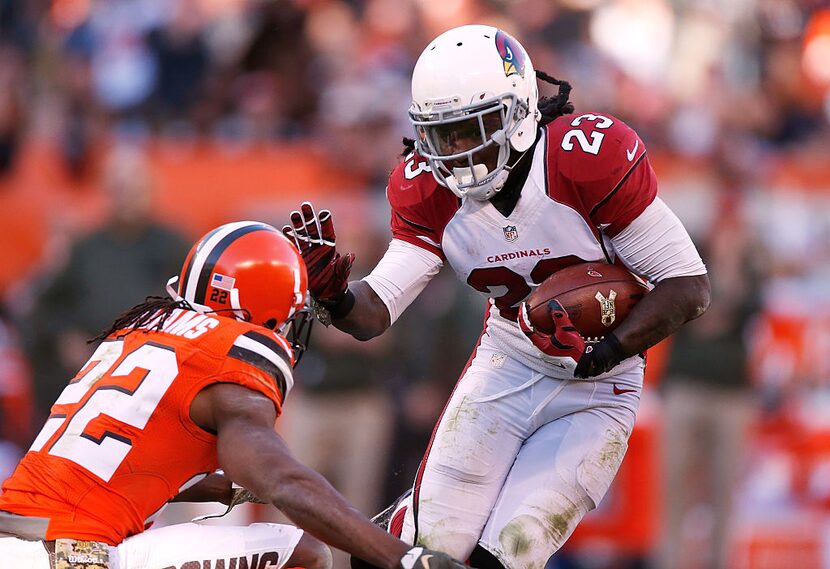 CLEVELAND, OH - NOVEMBER 01: Chris Johnson #23 of the Arizona Cardinals tries to get around...