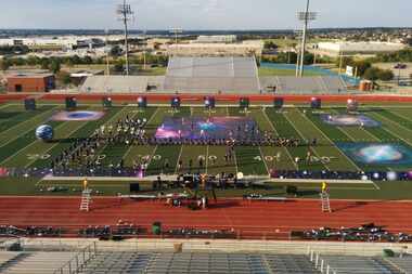  The Frisco High School marching band performs its 2015 show, "When We Left Earth." (Photo...