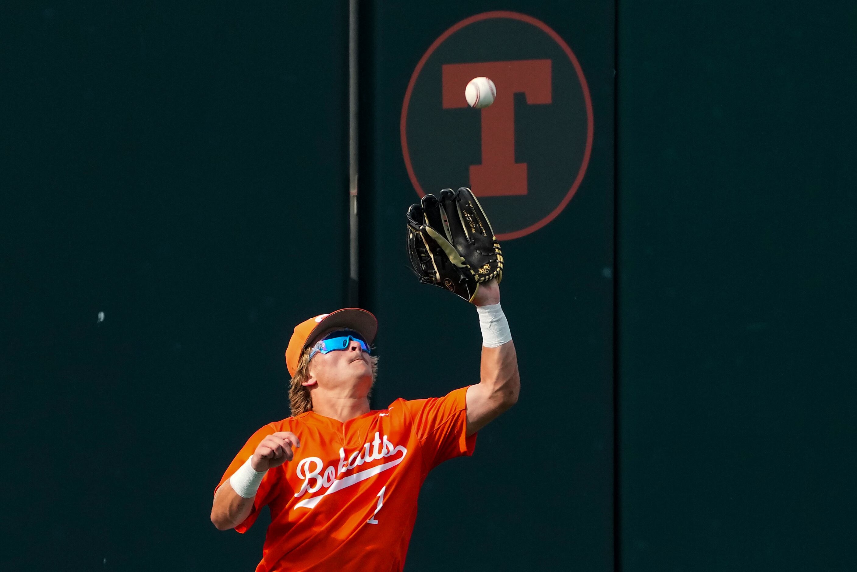 Celina outfielder Sean Rabe catches a fly ball during a UIL 4A baseball state semifinal game...