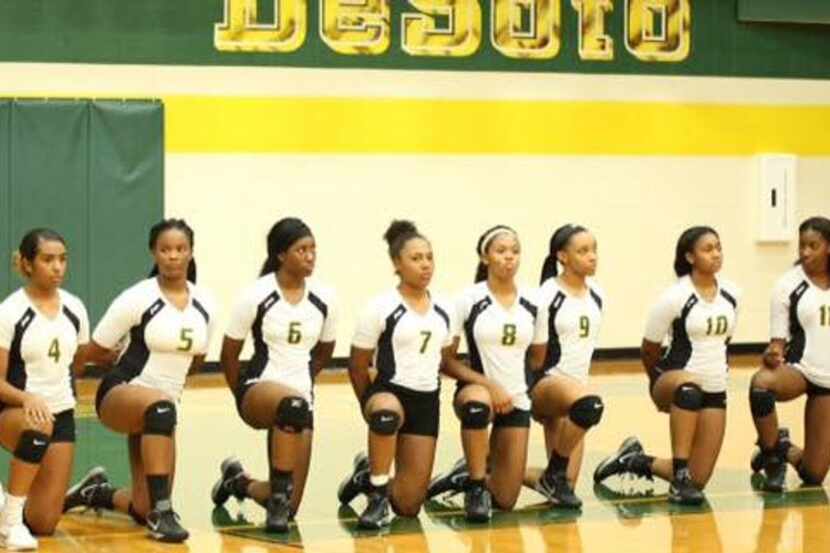 The DeSoto High School volleyball team knelt during the national anthem Tuesday night.