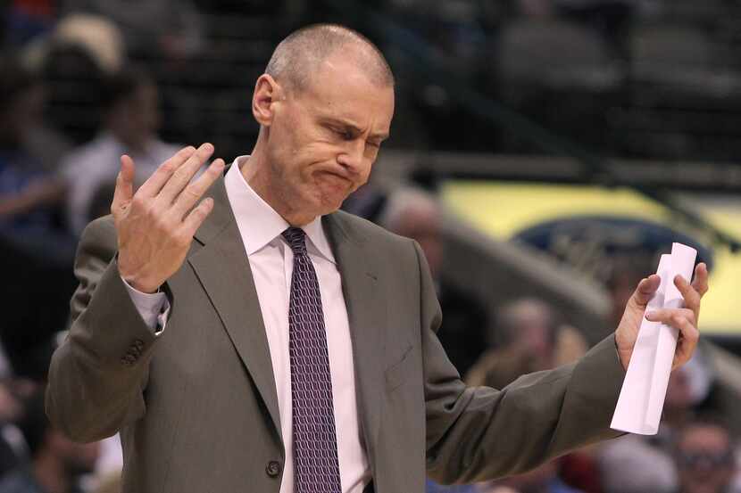 Dallas Mavericks head coach Rick Carlisle huddles his team in the second half of NBA...