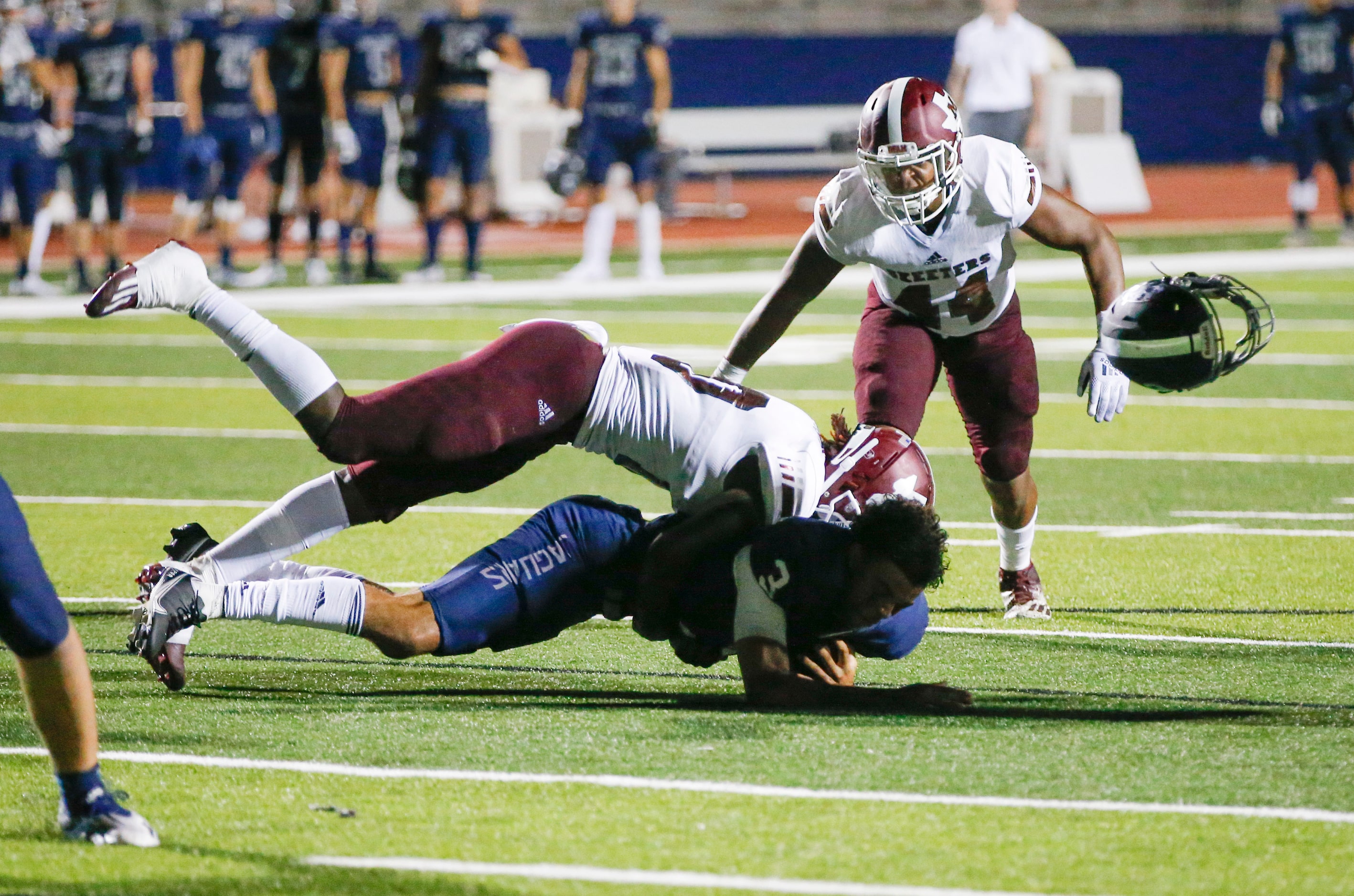 Mesquite senior linebacker Josh Williams (10) tackles Flower Mound senior quarterback Nick...