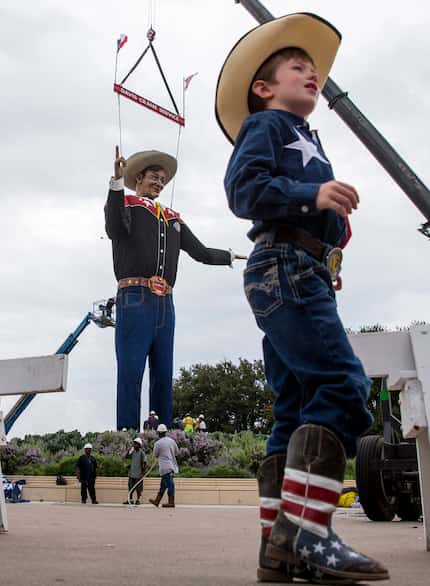 Visiting Fair Park with his family, 5-year-old Isaiah Lee was decked out Friday in Big Tex's...