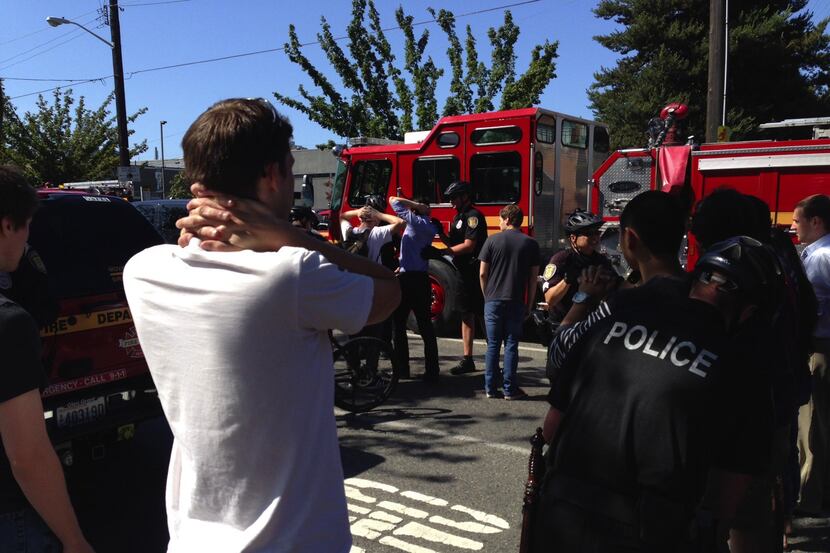 Emergency personnel arrive on the scene near a shooting on the Seattle Pacific University...