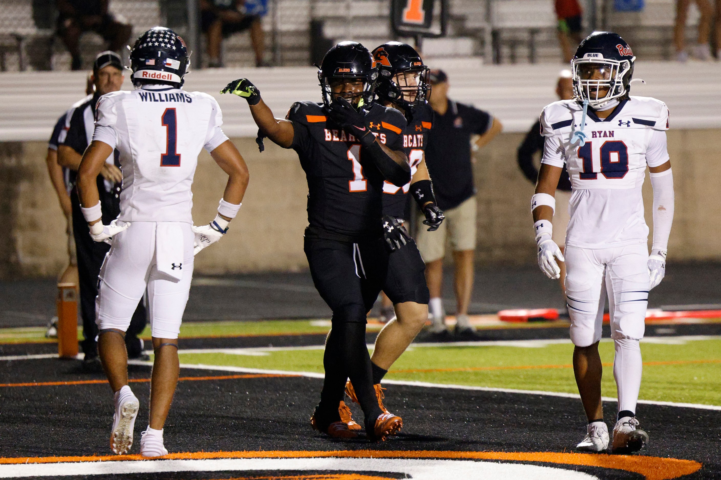 Aledo running back Raycine Guillory Jr. (1) celebrates after rushing for a touchdown during...