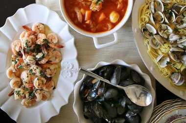 The writer’s family’s  Feast of the Seven Fishes includes (clockwise from bottom left)...