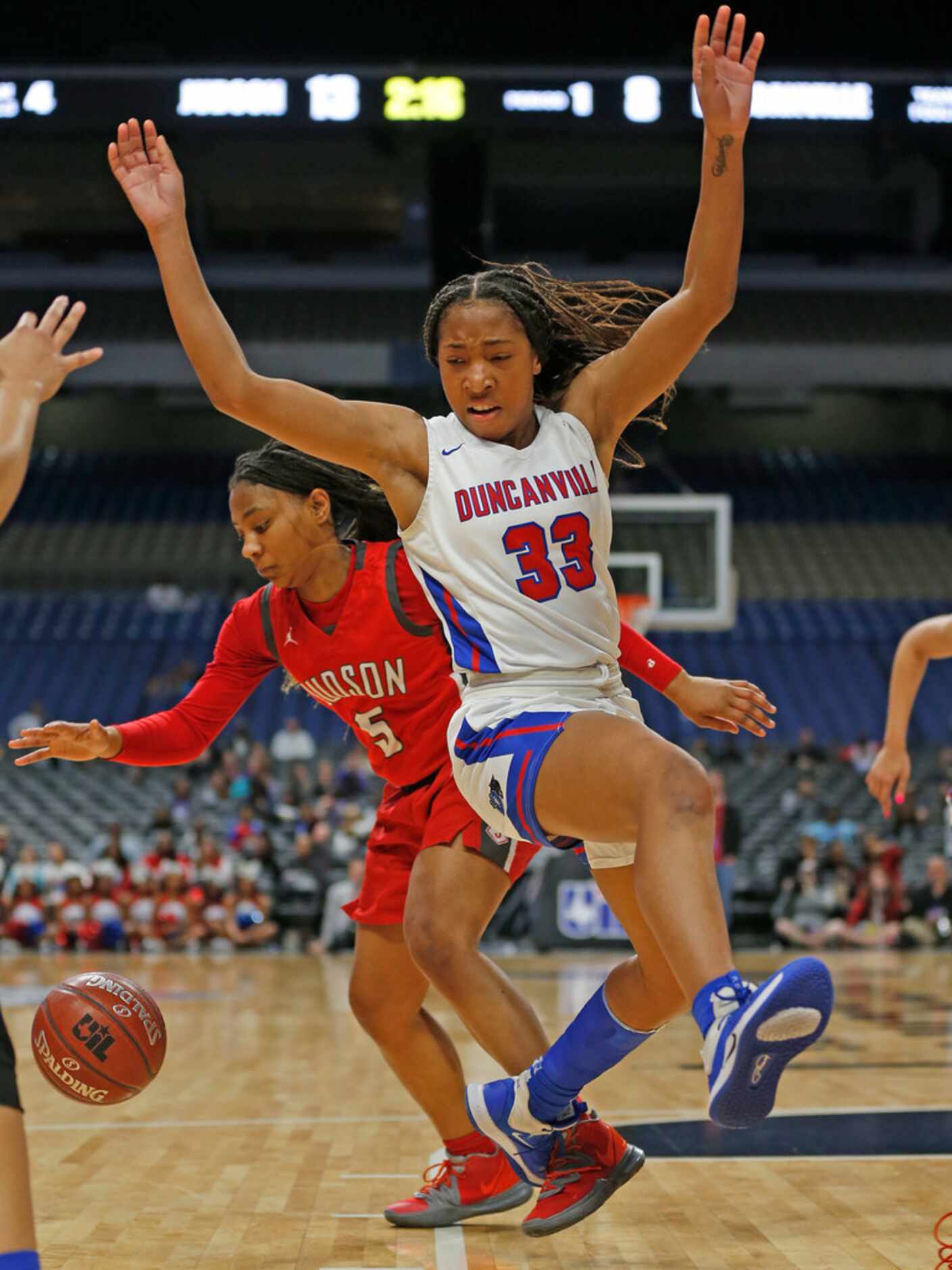 Duncanville guard Nyah Wilson #33 tries to make a steal on Judson guard Michaela Verrett #5...