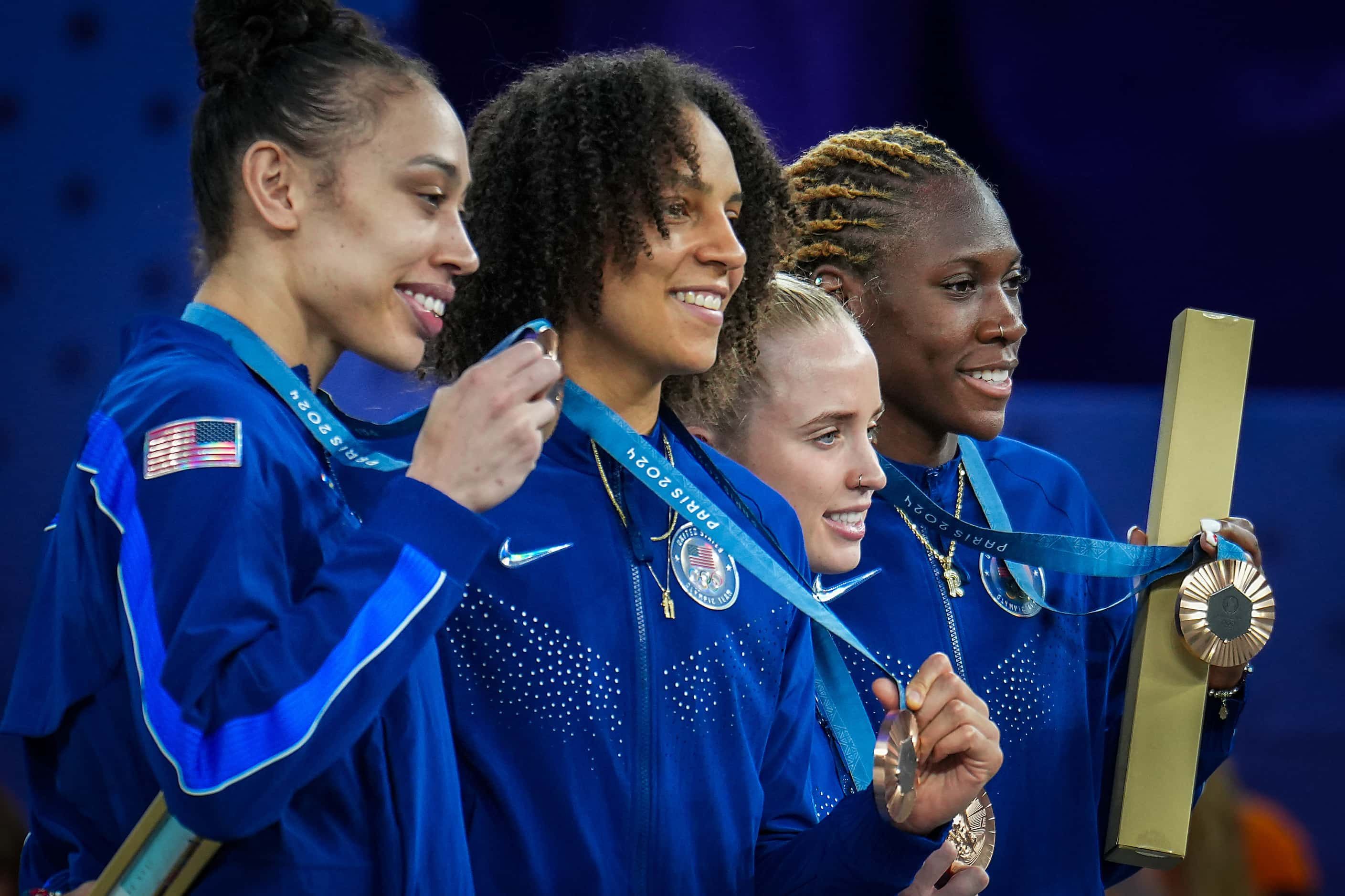 Team USA (from left) Dearica Hamby, Cierra Burdick, Hailey van Lith and Rhyne Howard pose...