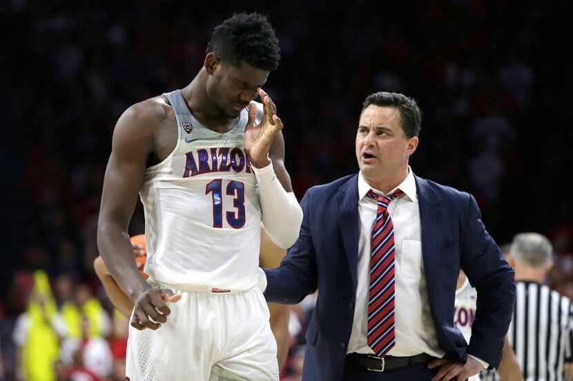 Arizona forward Deandre Ayton (13) and Sean Miller in the first half during an NCAA college...