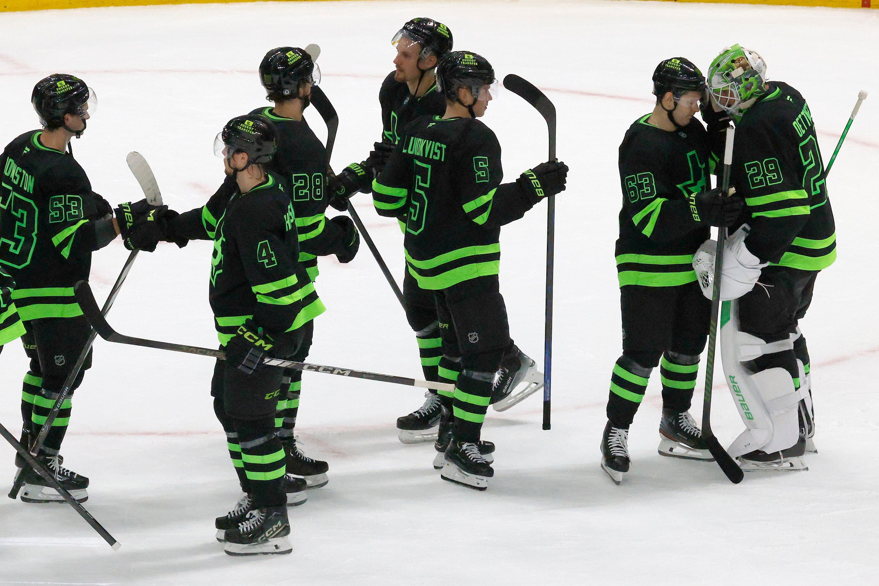 Dallas Stars players celebrate their 5-3 victory against the Colorado Avalanche after an NHL...