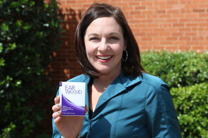Elyse Stoltz Dickerson, a CEO and founder of Eosera takes a photo with her new earwax...
