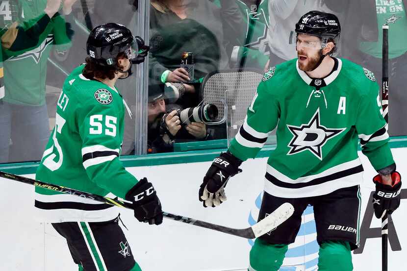 Dallas Stars center Tyler Seguin (91) is congratulated on his third period goal by teammate...