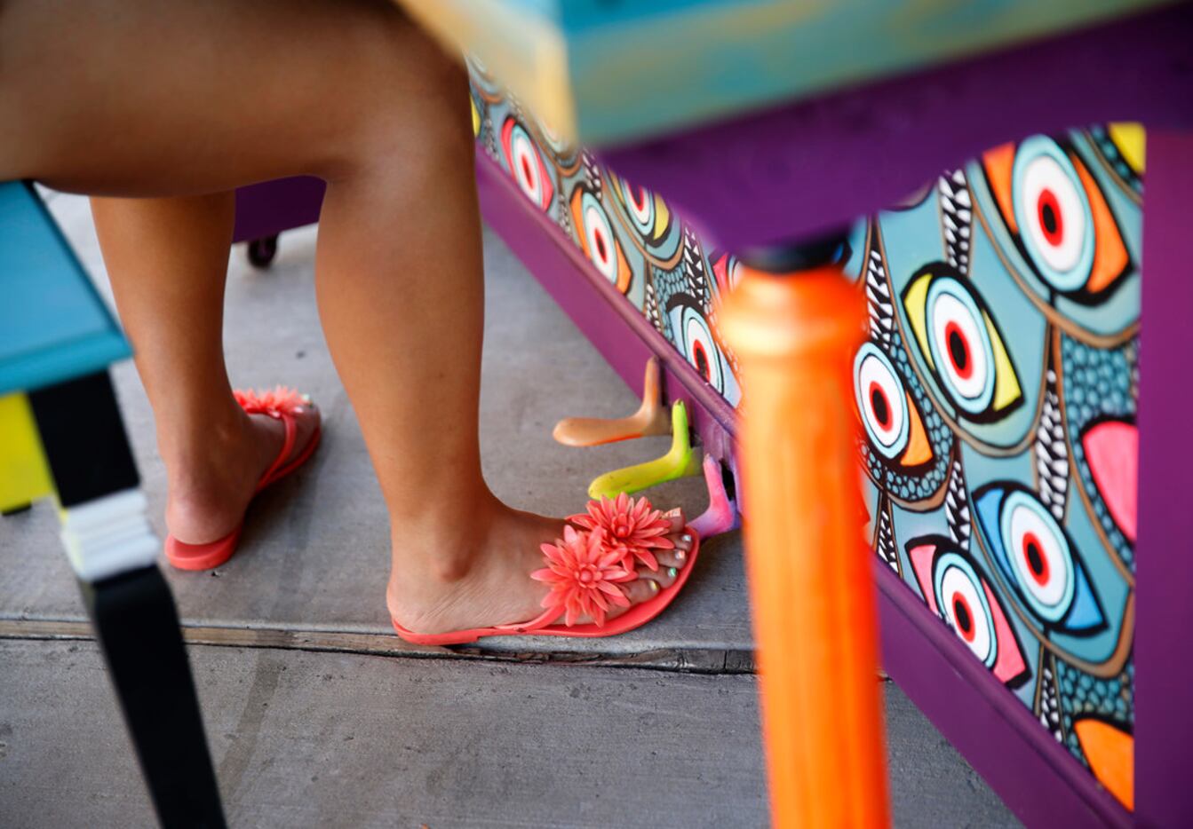 Sunny Yun, a UNT music doctoral student, works the foot pedal as she plays on artist Leigha...