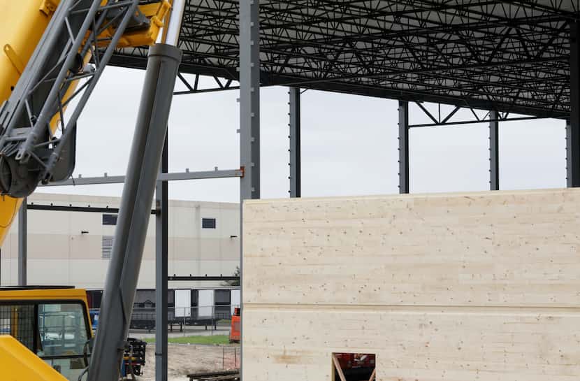 The exterior of the new warehouse is covered in 60-foot laminated timber panels.
