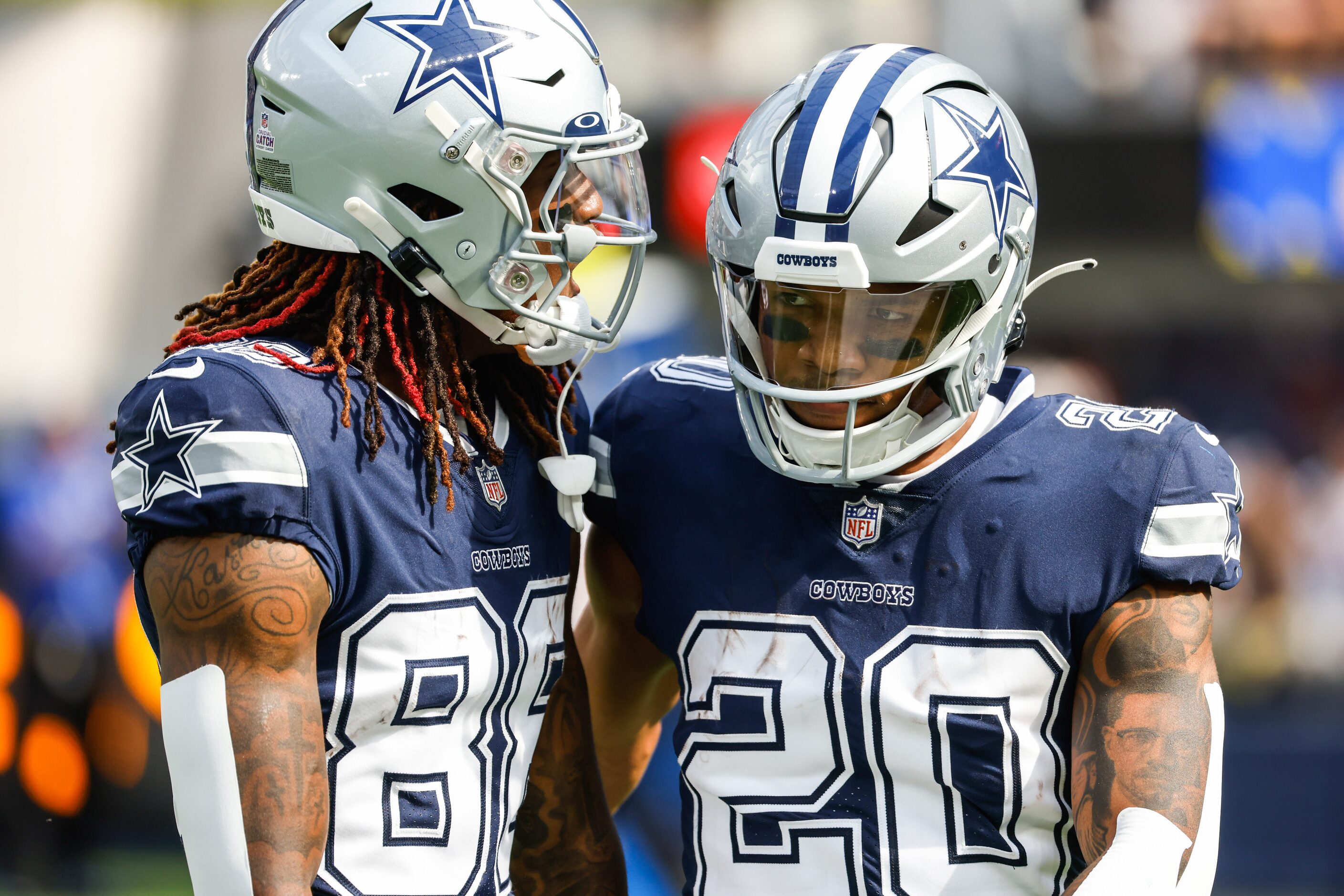 Dallas Cowboys running back Tony Pollard (20) celebrates a touchdown with wide receiver...