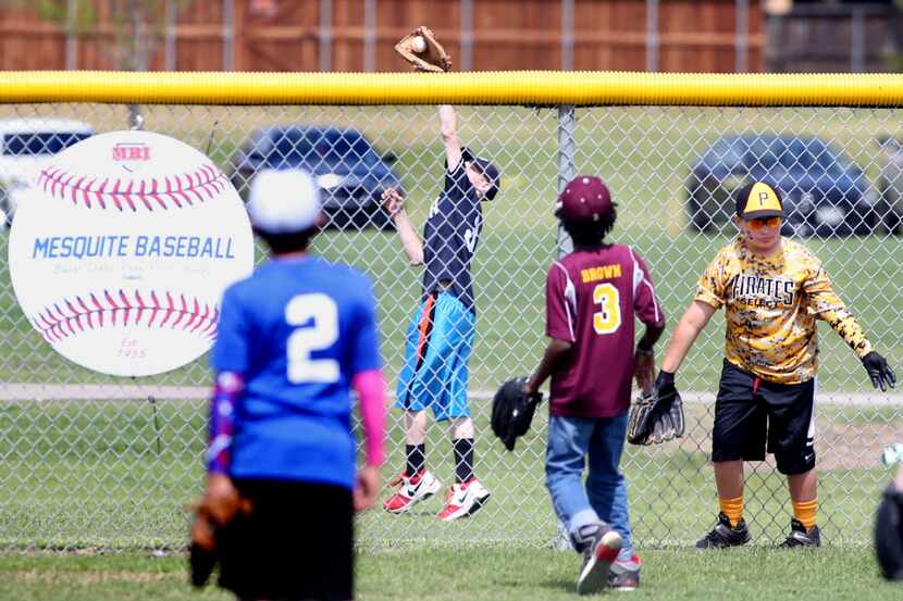  Youth baseball league players participate in a home run derby at Mesquite's Valley Creek...