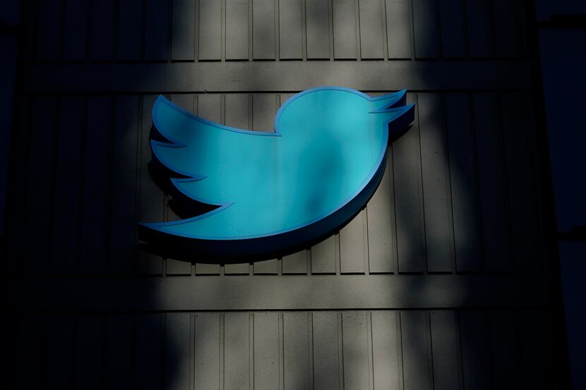 FILE - A sign at Twitter headquarters is shown in San Francisco, Friday, Nov. 18, 2022. Elon...