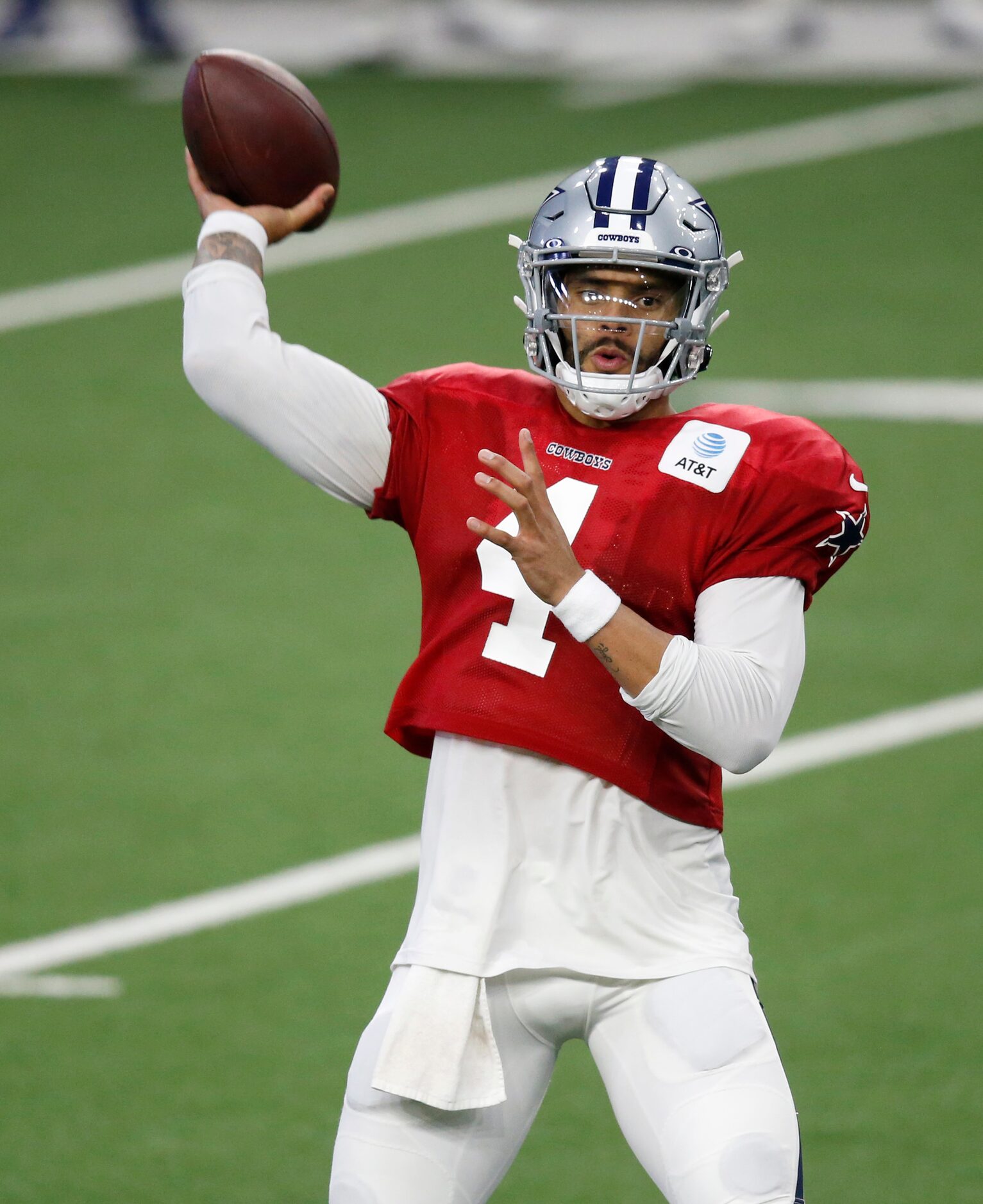 Dallas Cowboys quarterback Dak Prescott (4) attempts a pass in practice during training camp...