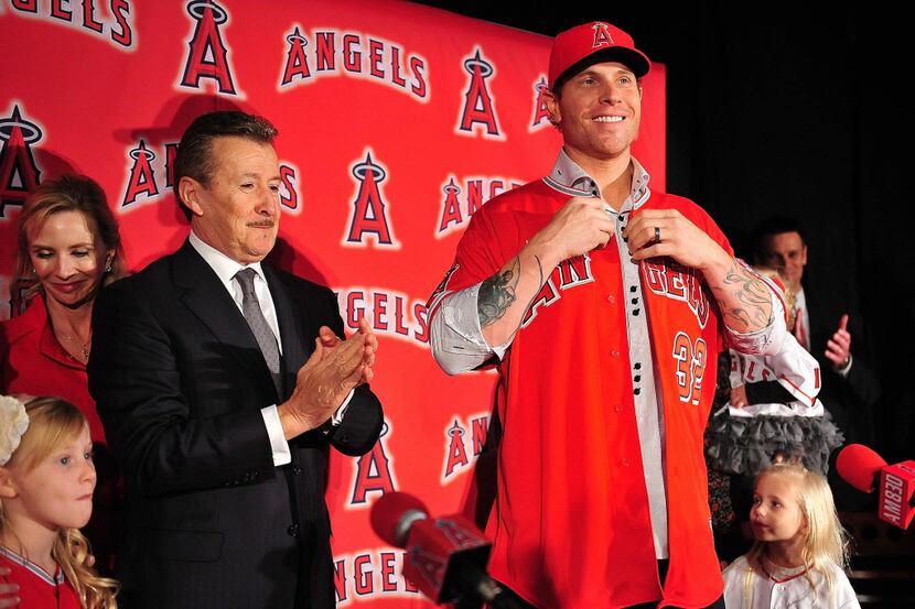 Dec 15, 2012; Los Angeles, CA, USA; Los Angeles Angels owner Arte Moreno (left) introduces...