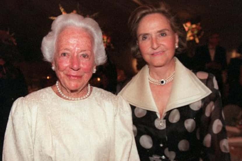 Margaret McDermott (left) and Mrs. Leonard Firestone attend the 'Women's Garden' celebration...