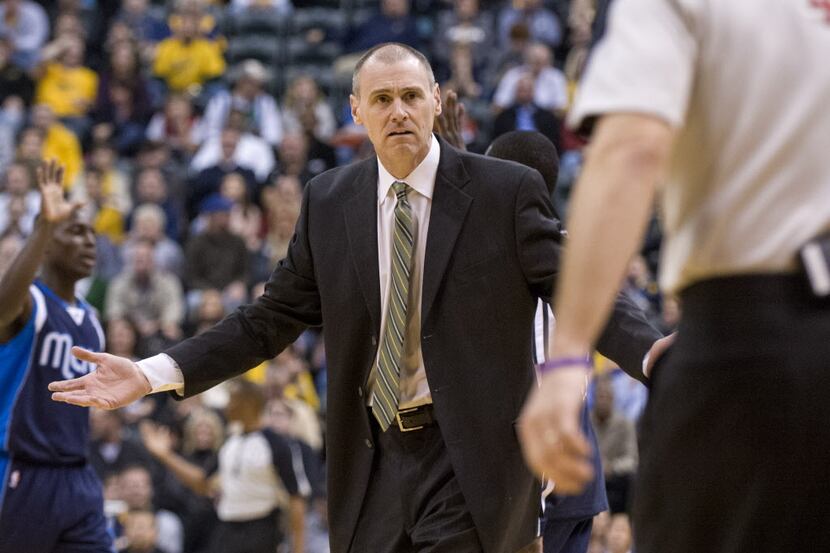 Dallas Mavericks head coach Rick Carlisle questions why a foul call was not made after one...