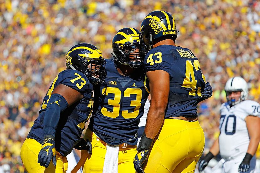 ANN ARBOR, MI - SEPTEMBER 24: Chris Wormley #43 of the Michigan Wolverines celebrates after...