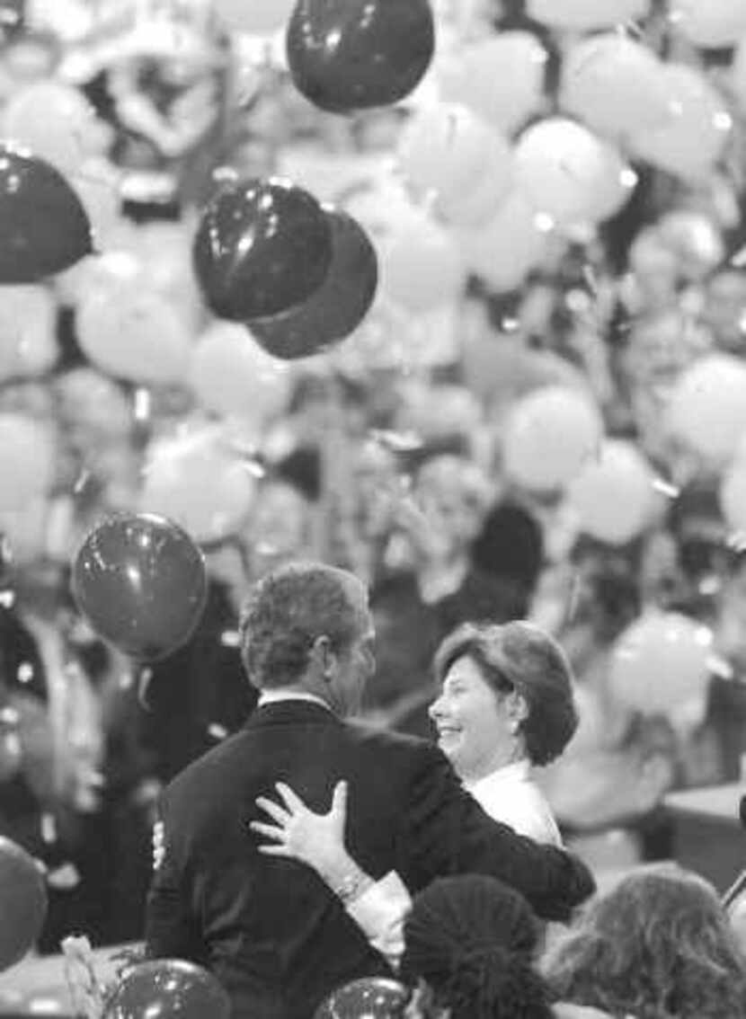  George W. Bush and wife Laura celebra- ted after he accepted the GOP nomina- tion in 2000....