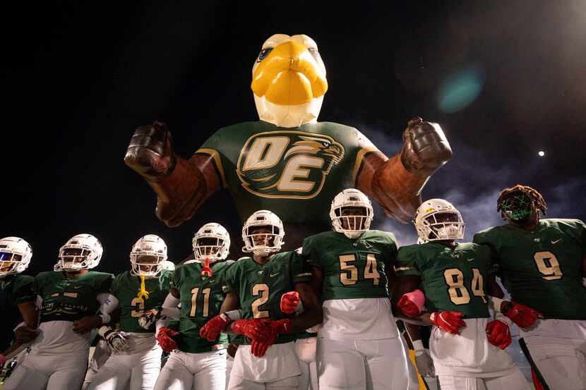 The DeSoto Eagles take the field before a high school football game against Cedar Hill on...