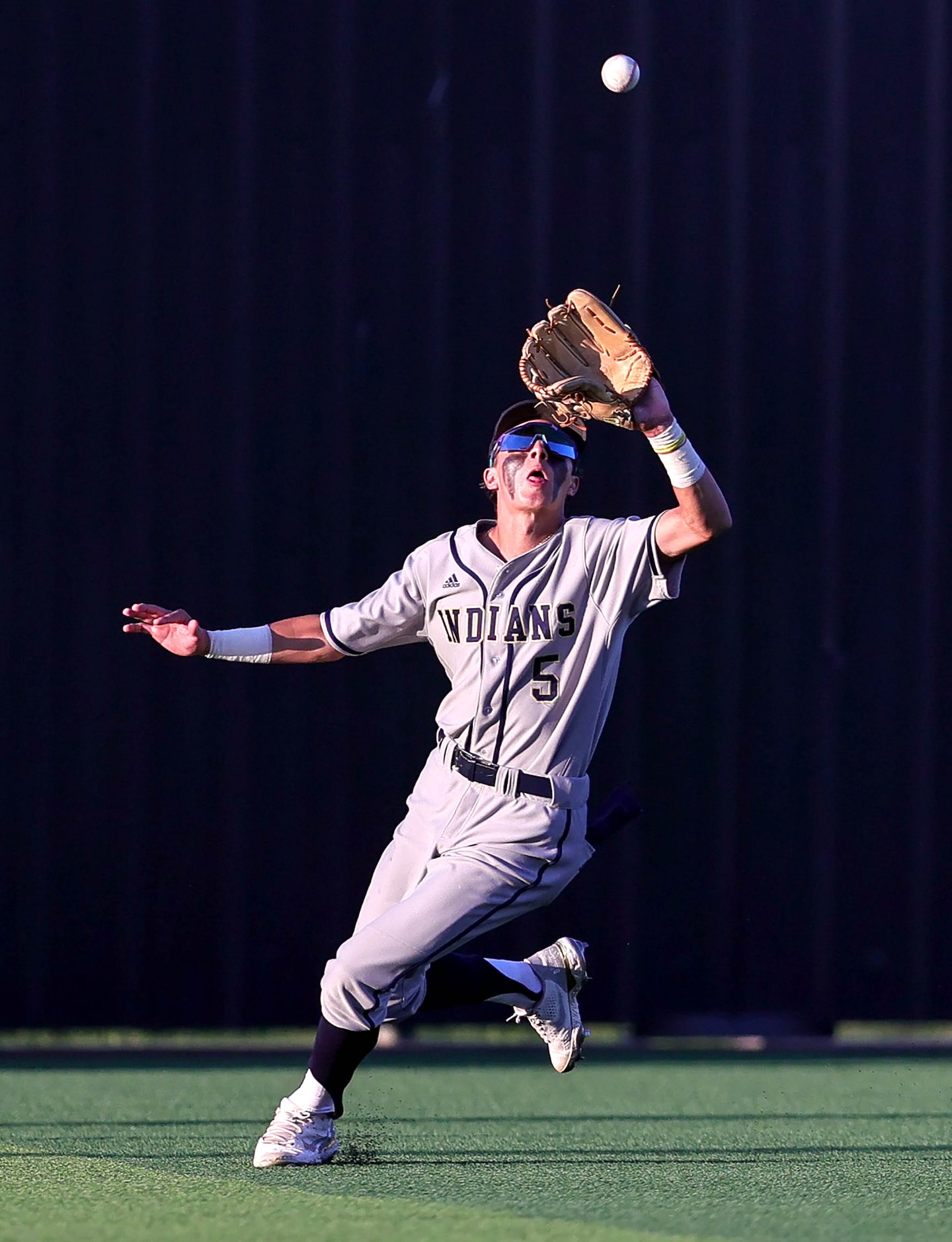 Keller center fielder Jackson Hill zones in on a flyball against Flower Mound Marcus during...