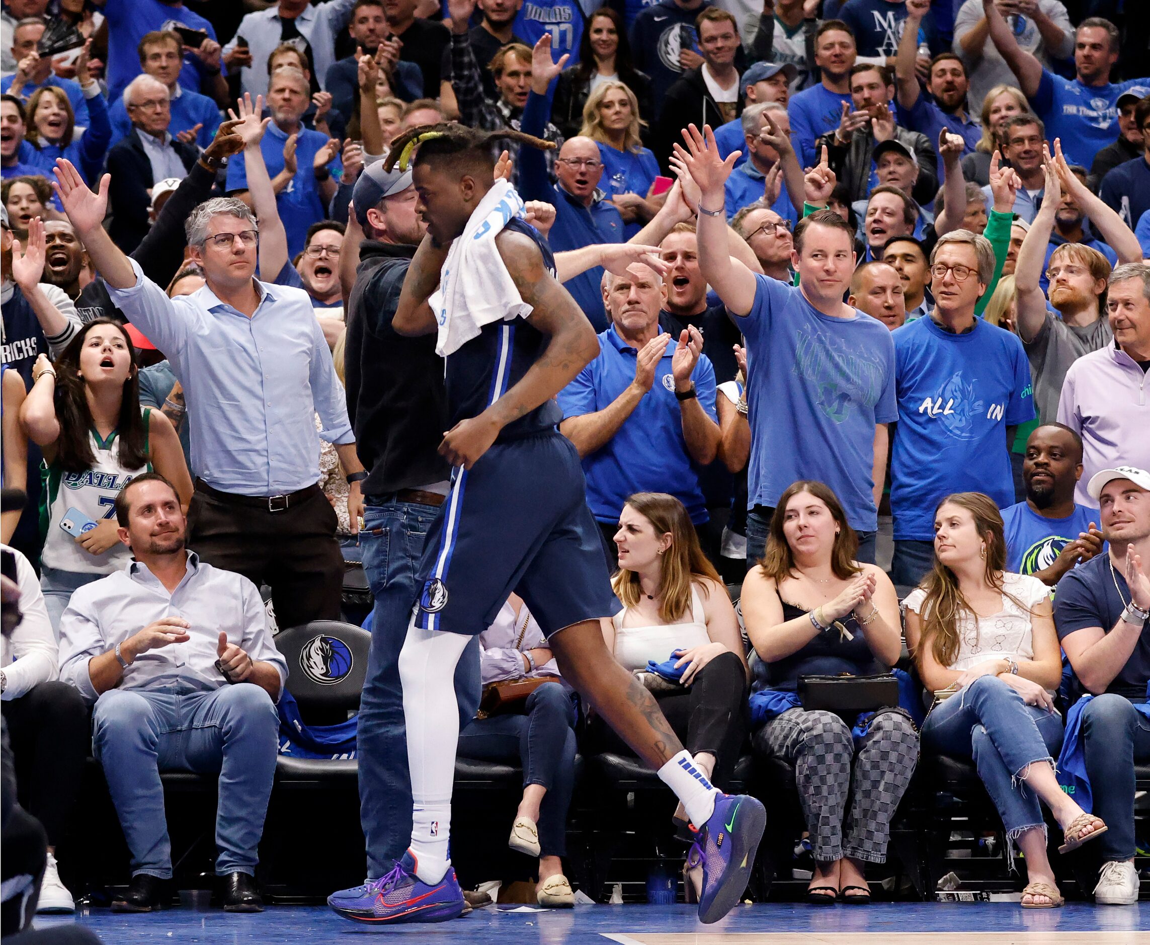 Dallas Mavericks forward Reggie Bullock (25) heads for the locker room after being ejected...