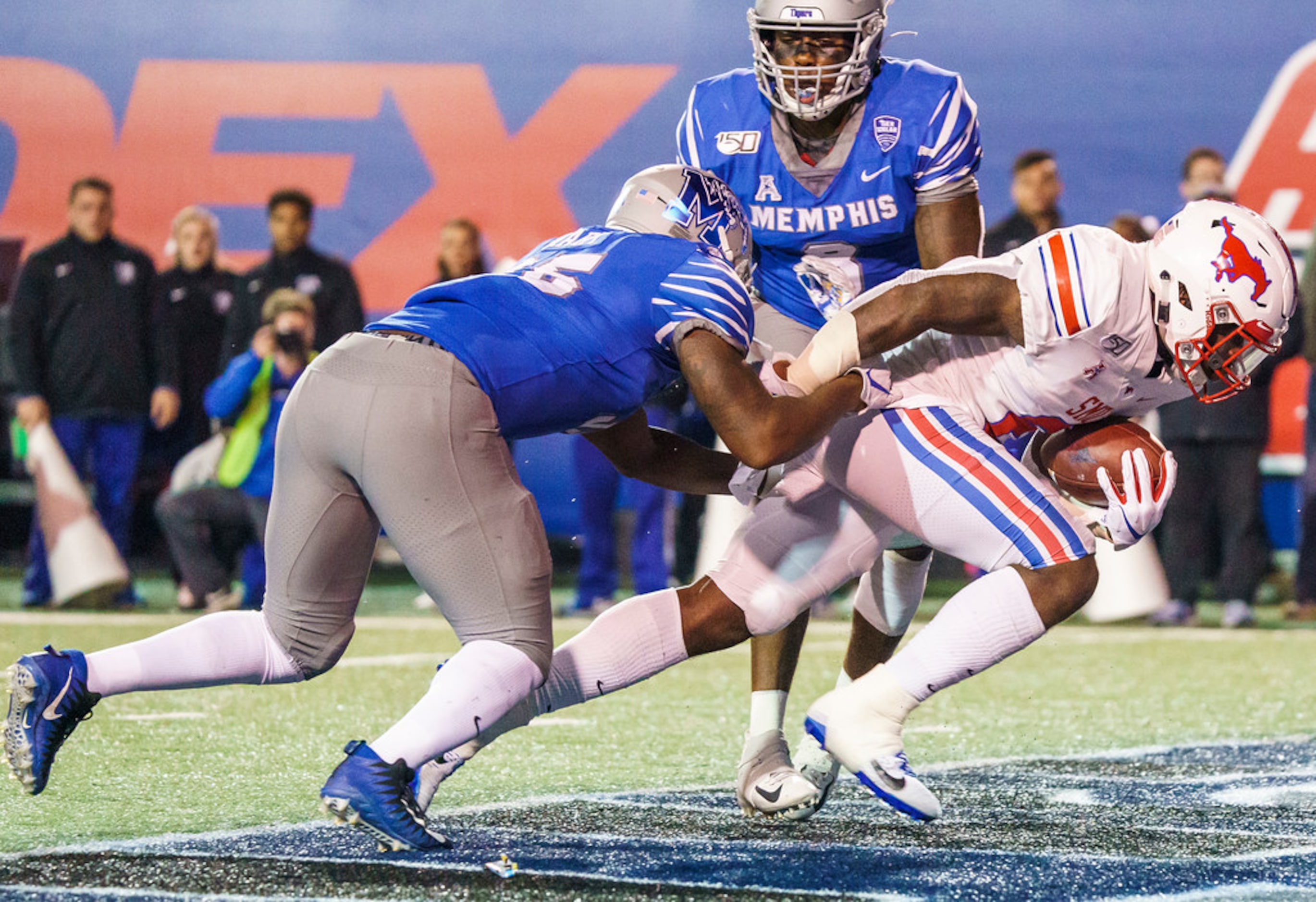 SMU running back Ke'Mon Freeman (2) scores on a 2-yard touchdown run during the second half...