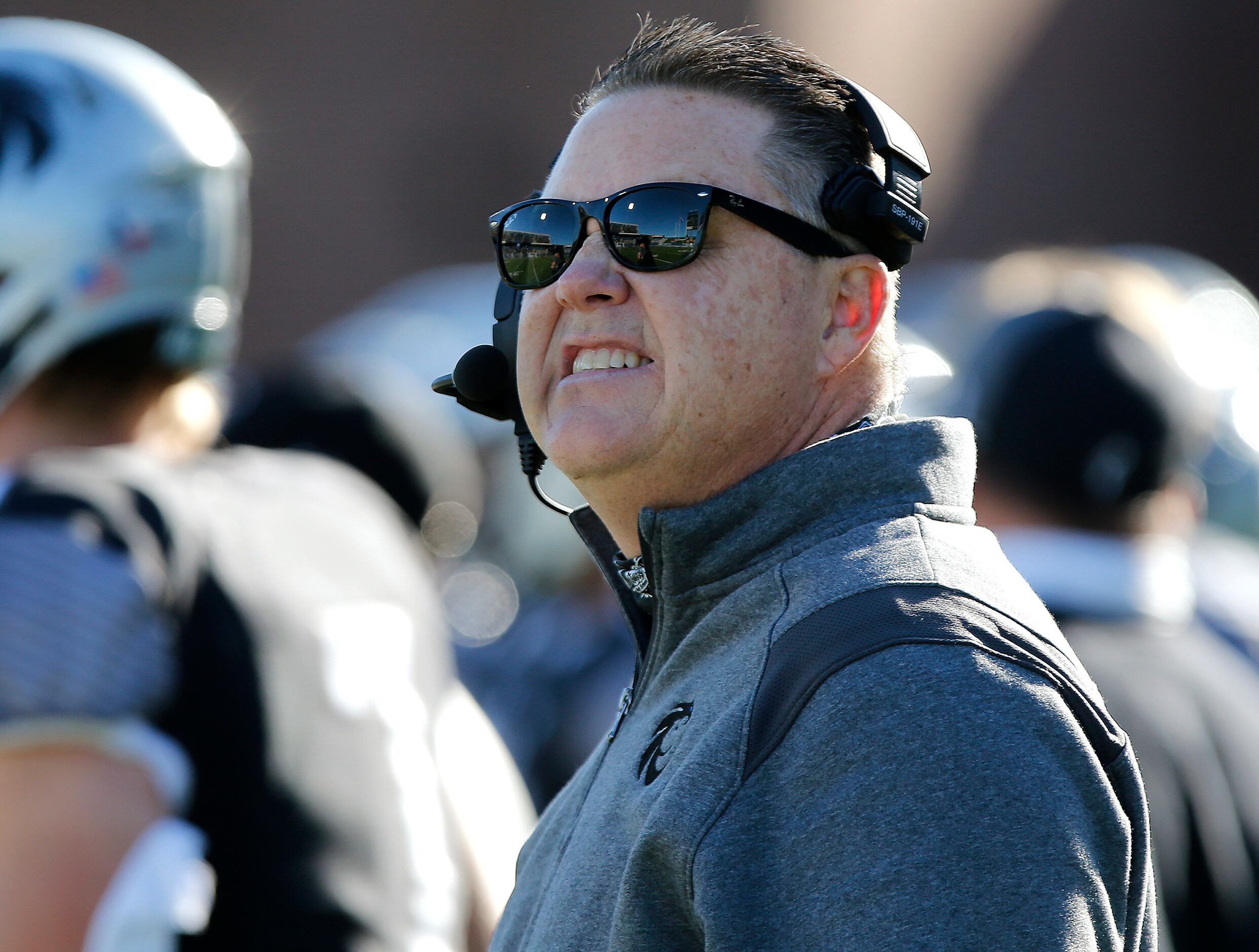 Denton Guyer High School head coach Rodney Webb checks the scoreboard during the second half...