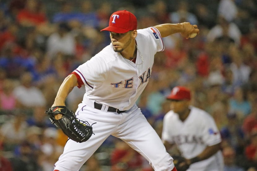Texas Rangers relief pitcher Alex Claudio (58) is pictured during the Oakland Athletics vs....