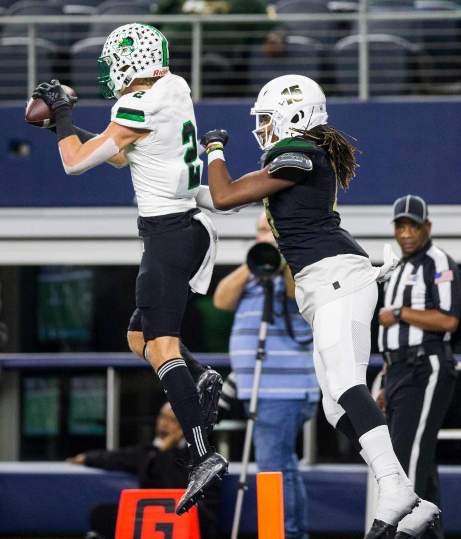 Southlake Carroll defensive back Dylan Thomas (2) intercepts a pass intended for DeSoto...