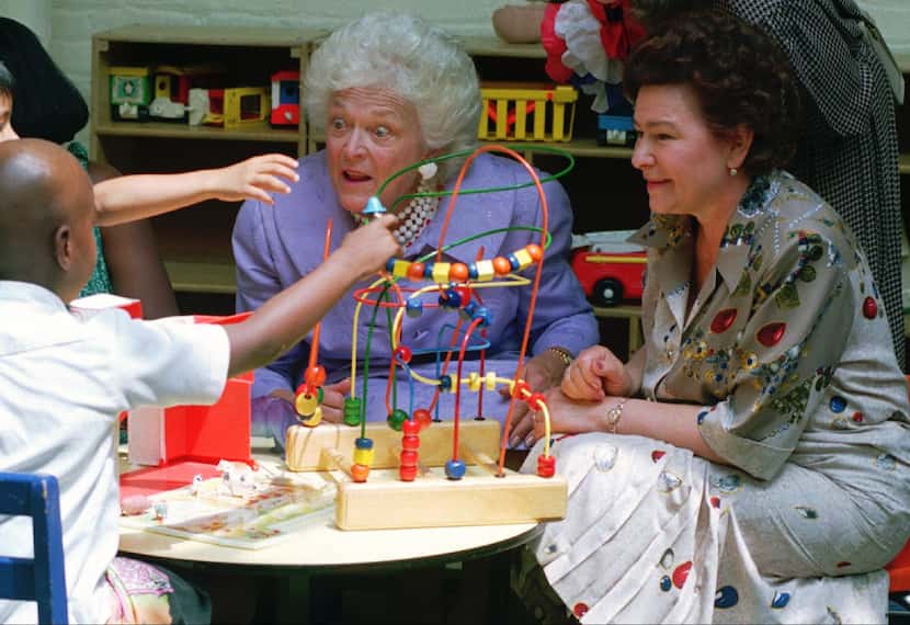 First lady Barbara Bush and Russian first lady Naina Yeltsin played with children during a...