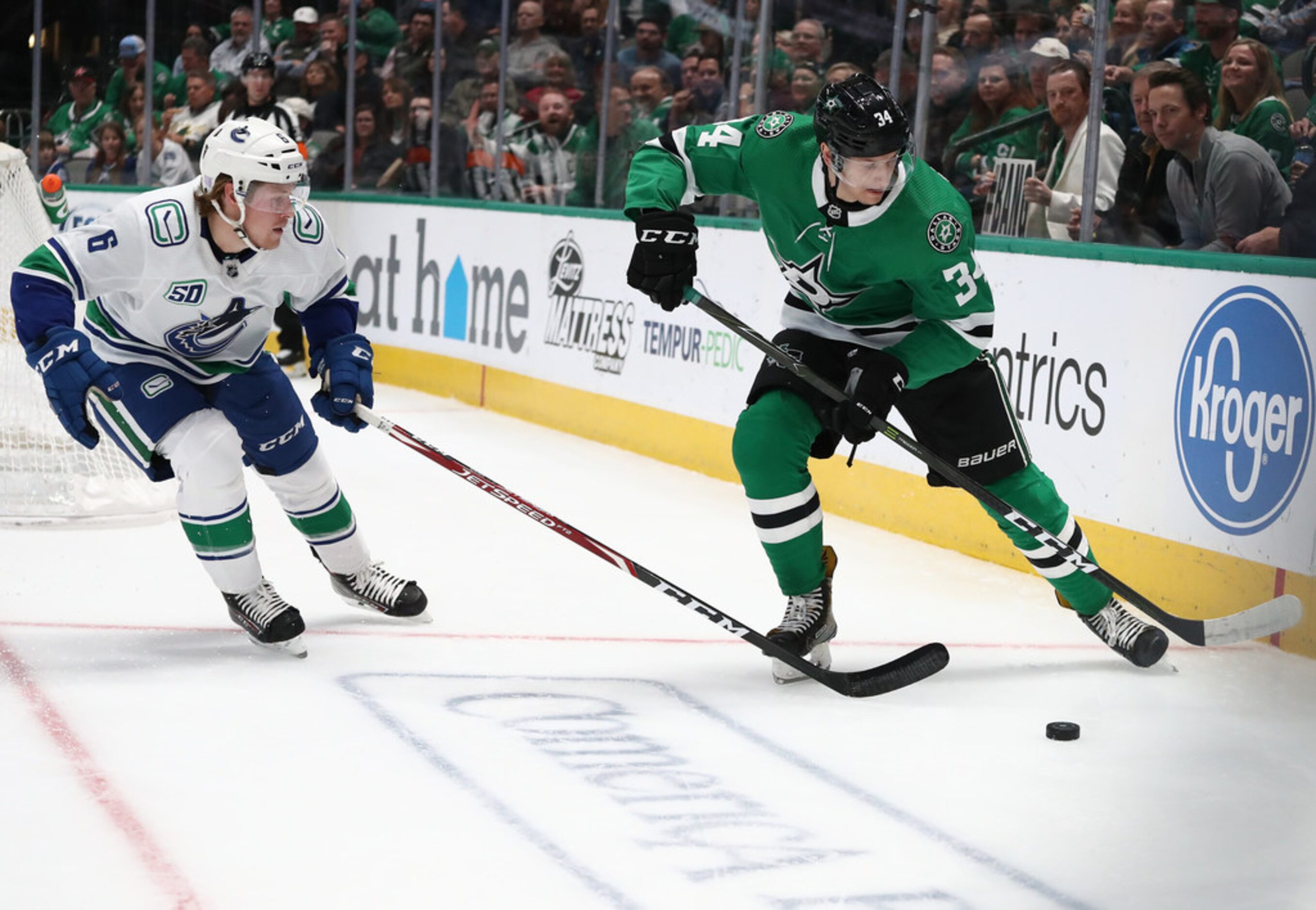 DALLAS, TEXAS - NOVEMBER 19:  Denis Gurianov #34 of the Dallas Stars skates the puck against...