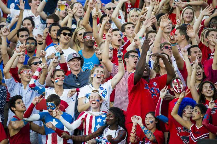SMU fans cheer their team during the first quarter of an NCAA football game against North...