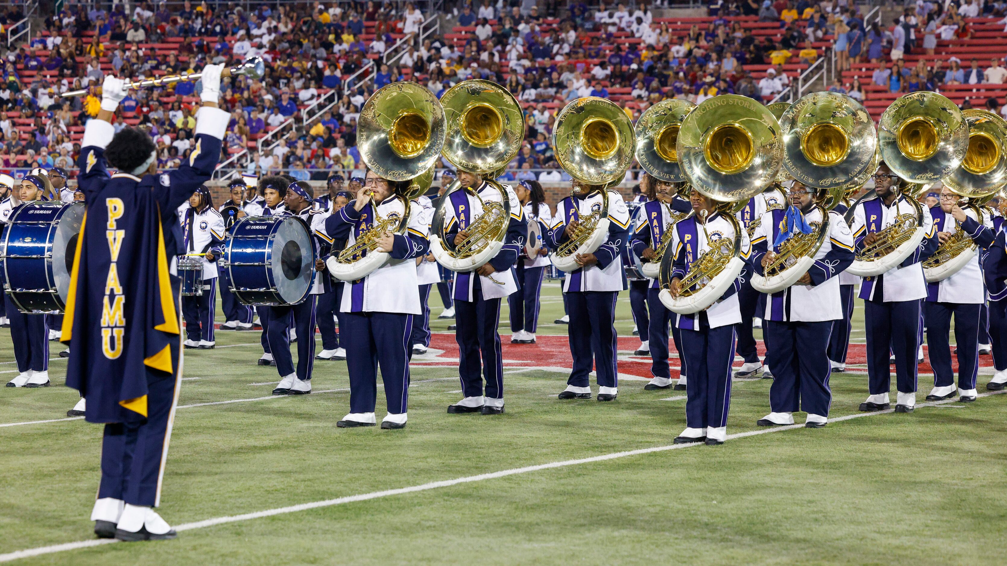 Prairie View A&M’s Marching Storm Band performs during halftime of an NCAA football game...