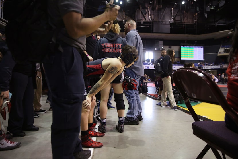 Euless Trinity's Mack Beggs, a transgender male, watches a future opponent Cypress Ranch's...